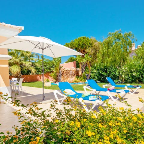 Laze on the poolside loungers after a day of discovering the Algarve coastline