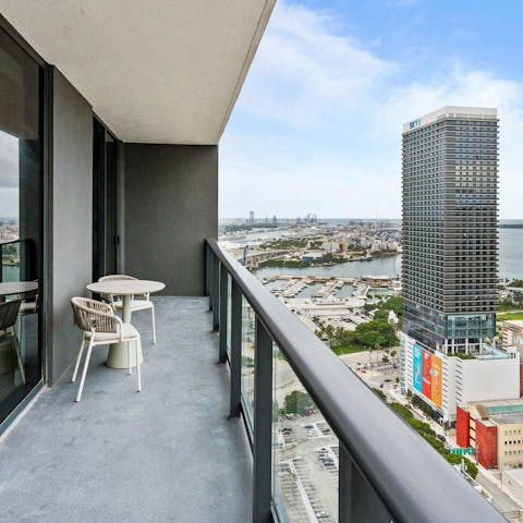 Enjoy your morning coffee on the balcony, high up in the sky