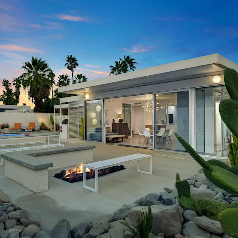 Enjoy the outdoor space with a grill and cosy fire pit for evenings together