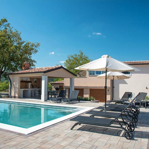 Find your place by the pool for a lazy afternoon