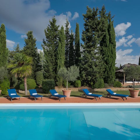 Soak up the Italian heat on sun loungers before a dip in the private pool