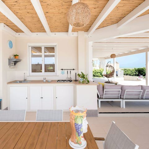 Prepare delicious Sicilian-inspired feasts and enjoy them in the alfresco dining area