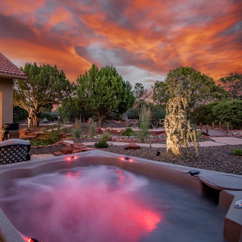 Watch the sunset as you soak in the private hot tub