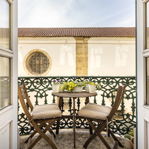 Relax with chilled drinks on the balcony