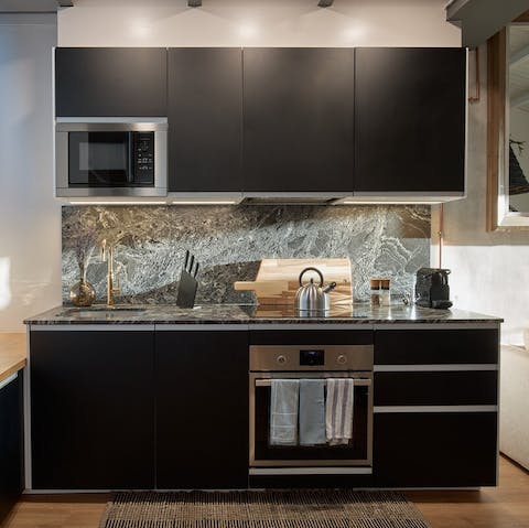 Prepare lunch on the sleek kitchen worktop