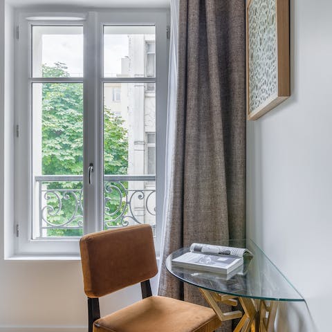 Pen a few lines of poetry at the writing desk