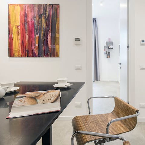 Sip your morning espresso at the breakfast bar, while plotting out your Roman adventure