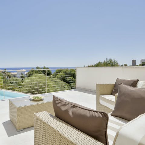 Enjoy sundowners on the terrace, admiring the sea in the distance