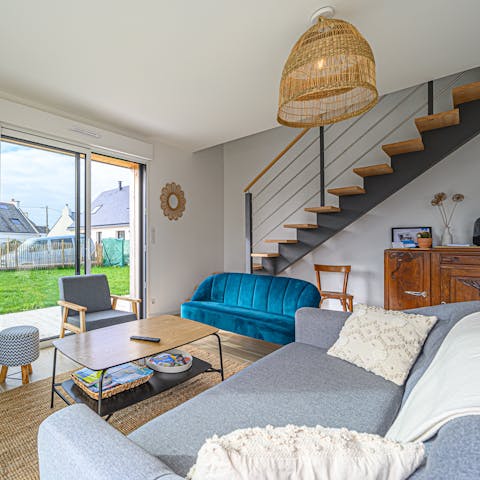 Rest weary feet in the cosy living area after a cycle along the coast