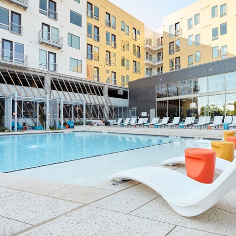 Spend afternoons catching some rays by the communal pool