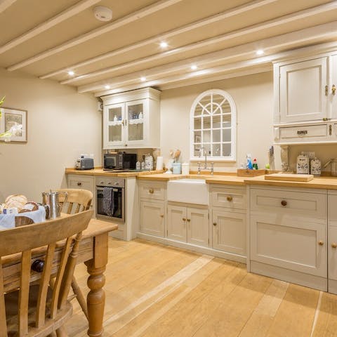 Cook up a storm in the farmhouse kitchen and share a meal around the table