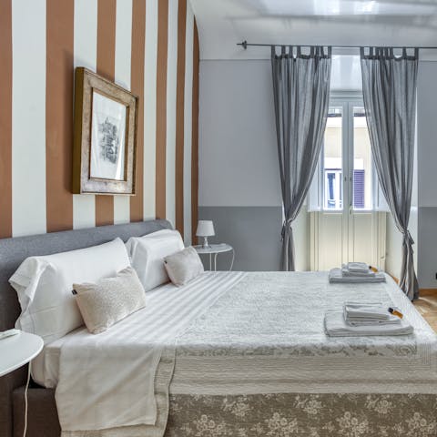 Rest up for a Roman adventure in the cosy bedrooms