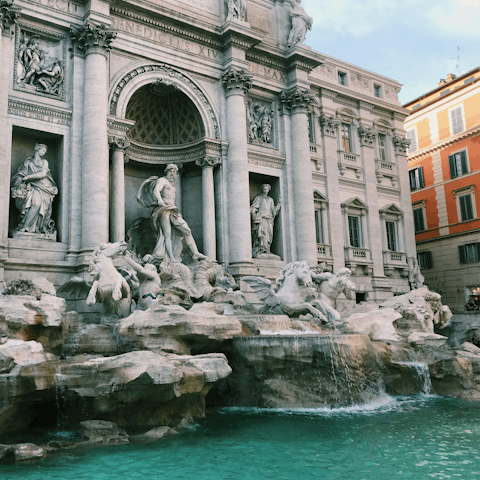 Toss a coin in the Trevi Fountain, just steps away