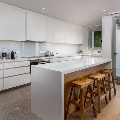 Gather around the kitchen island as you scramble eggs for breakfast