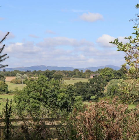 Take in the views over the Severn Vale, Malvern, and the Cotswold Hills