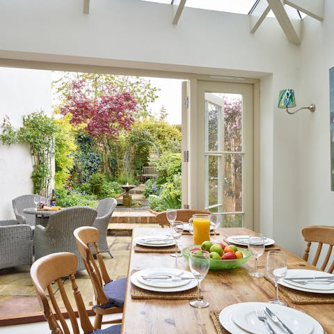 Take in the views of the courtyard garden with its tranquil water feature