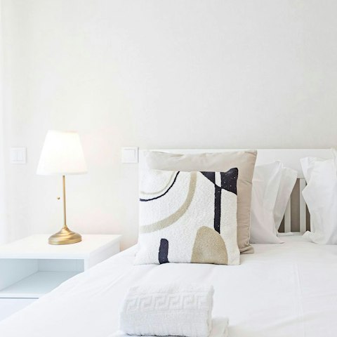 Snuggle up after an adventure-filled day in the comfortable bedroom