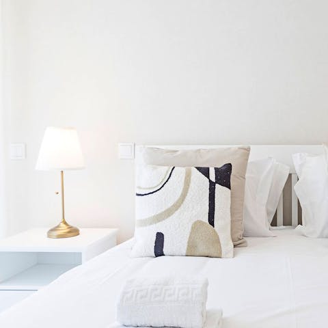 Snuggle up after an adventure-filled day in the comfortable bedroom