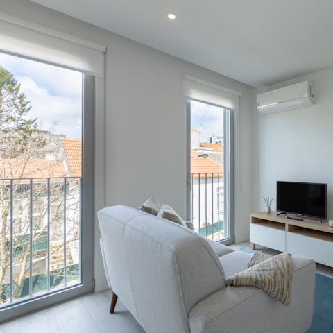 Throw open the glass doors and let a cooling breeze into the apartment while you nap