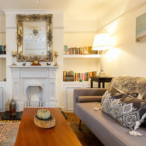 Curl up on the sofa with a book plucked from the shelves