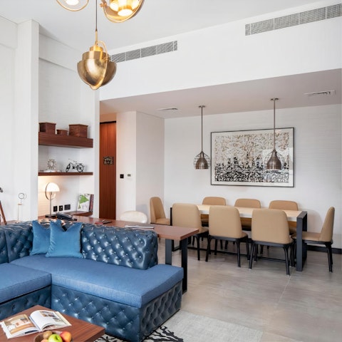 Gather around the table for beautiful meals as the sun sets across the city