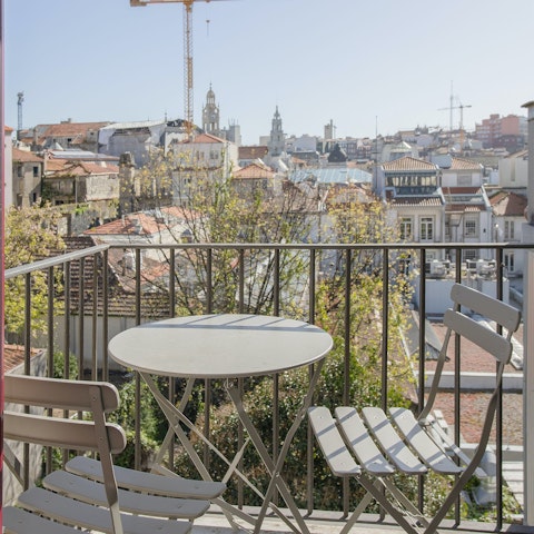 Bask in the sun as you look over the Porto rooftops