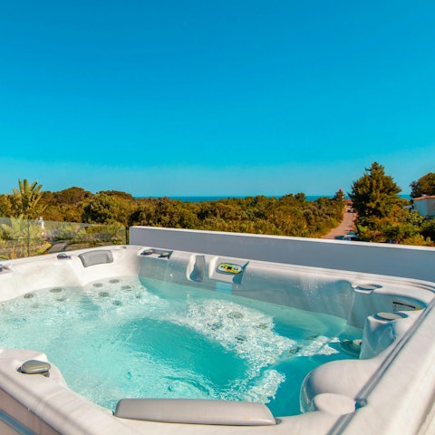 Soak in the Jacuzzi while you soak up the views