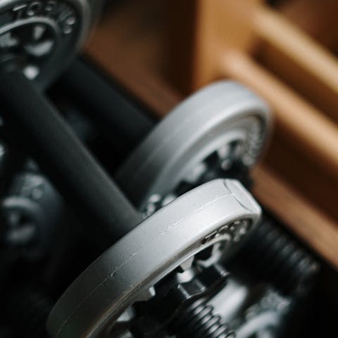 Stay on top of your fitness goals with a workout in the communal gym