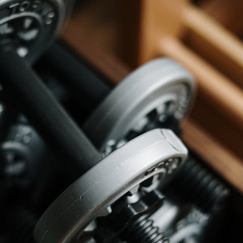 Stay on top of your fitness goals with a workout in the communal gym