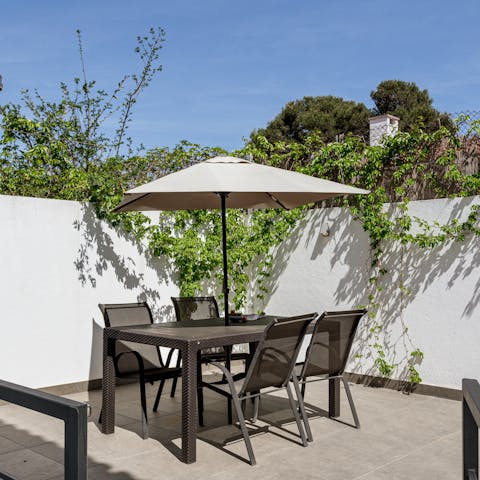Tuck into pastel de nata on the terrace