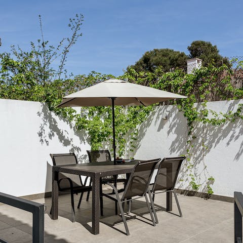 Tuck into pastel de nata on the terrace