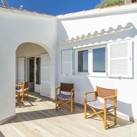 Take in the Mediterranean sun on the balcony