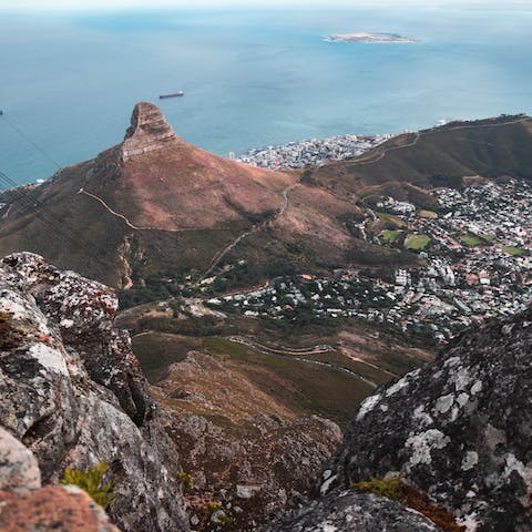 Embark on a climb up Table Mountain, a short drive away