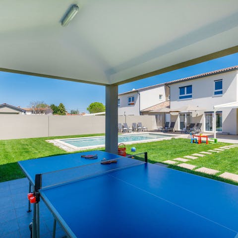 Challenge the family to a table tennis tournament before dinner
