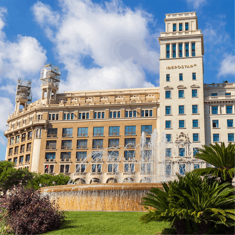 Stroll around the Plaça de Catalunya, it's just steps away