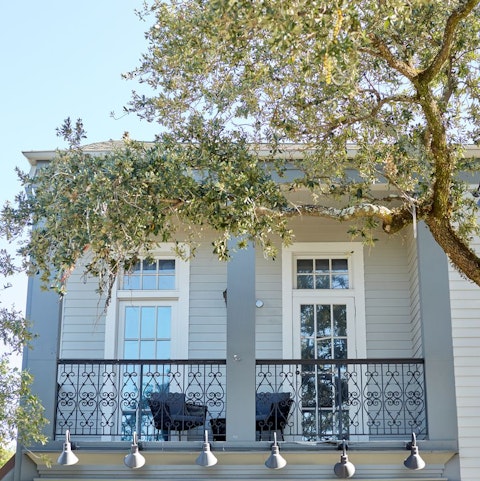 Sip lemonade on the shared balcony as the sun sets