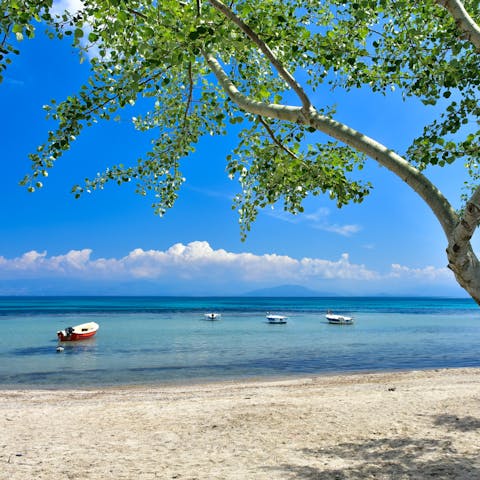 Discover secluded beaches and crystalline coastal waters on a boat trip