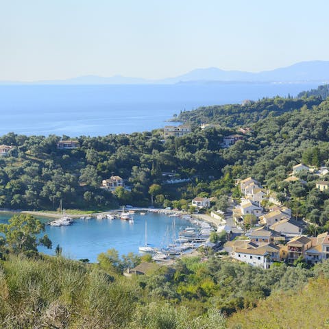 Treat yourself to sundowners and mouthwatering meals by Agios Stefanos' harbour