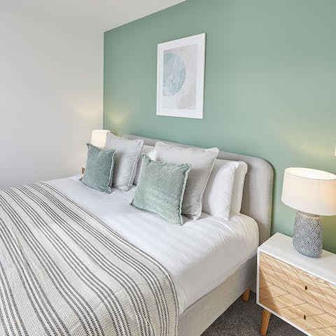 Wake up blissfully in your soft sheets, the waves rolling just outside your window