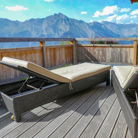 Sunbathe on the private balcony