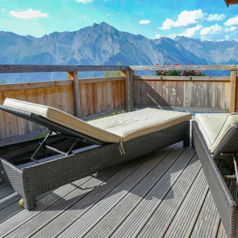 Sunbathe on the private balcony
