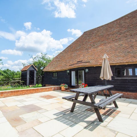 Picnic on a private patio with the sun shining on you