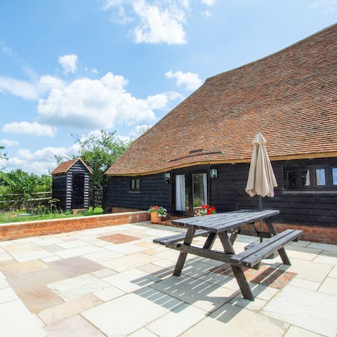 Picnic on a private patio with the sun shining on you