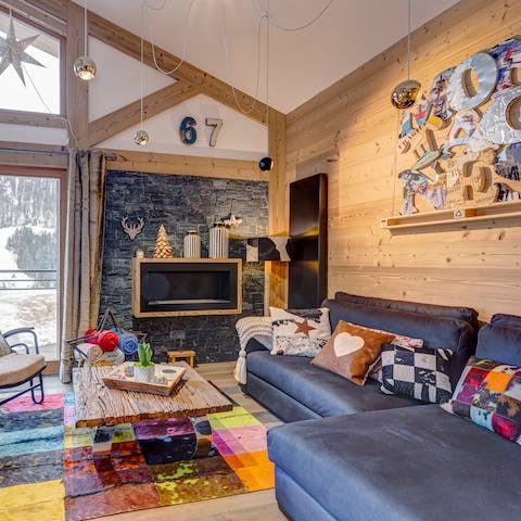 Stay warm in the eclectic and cosy lounge, filled with art and colour