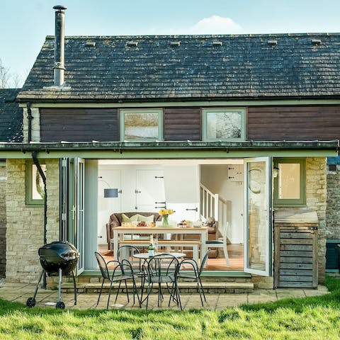 Rustle up a barbecue after exploring Somerford Lagoon, a minute away