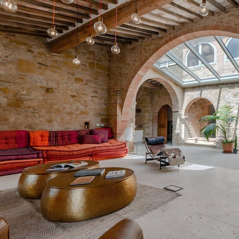 Gather together in the characterful living area after exploring Tuscany