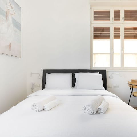 Put your feet up in your cosy bedroom after a busy day of sightseeing