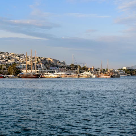Tuck into an array of Greek mezzes along the Port of Piraeus