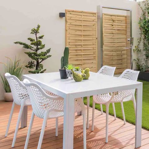 Sit down to an alfresco meal in the private terrace garden
