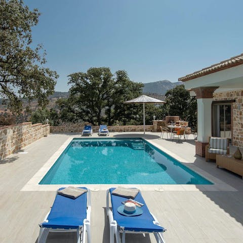 Jump into the swimming pool and bob about in the cool water